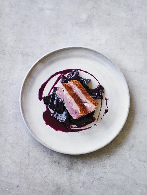 Pork knuckle with beer, juniper berries and caraway red cabbage