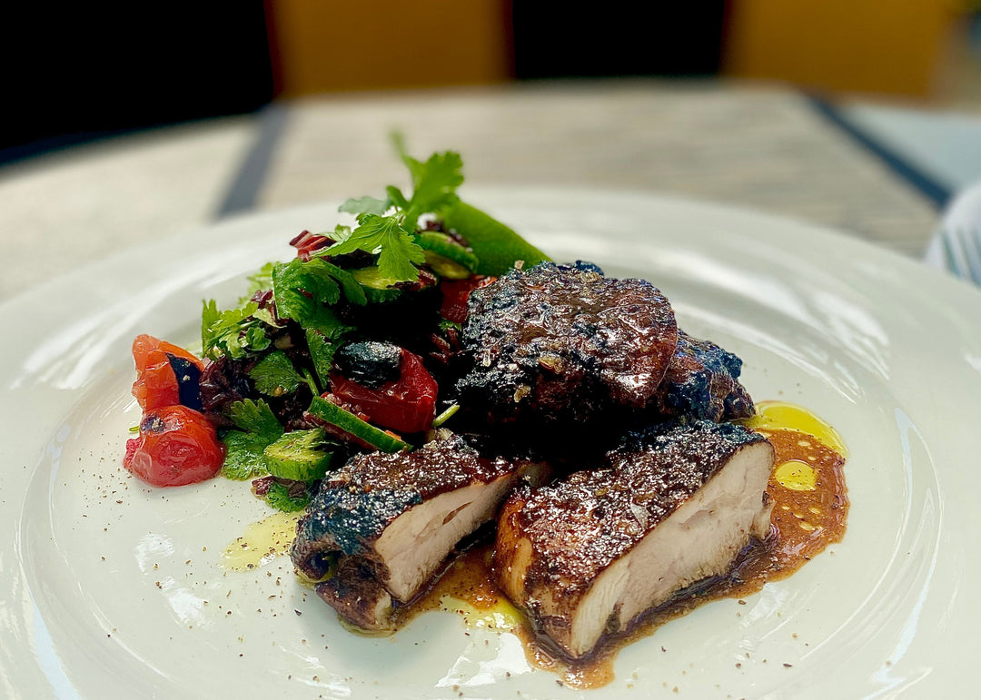 Jamaican Jerk Chicken Thighs with Charred Tomato Black Rice Salsa